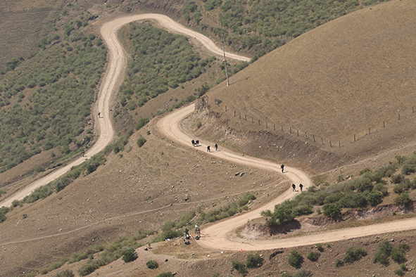 Fuerzas Comando 2016 competitors walk uphill about 20 kilometers carrying a 35 lbs rucksack on the forced march event May 9, 2016 in Santiago de Tuna, Peru. Fuerzas Comando is a unique opportunity for participating nations of the Western Hemisphere to improve their special operations capabilities. This competition increases training knowledge and furthers interoperability between participating countries. (U.S. Army photo by Spc. Christine Lorenz/ Released).